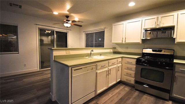 kitchen with a peninsula, exhaust hood, light countertops, stainless steel range with gas cooktop, and dishwasher