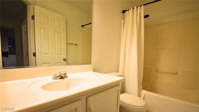 full bathroom featuring toilet, shower / bath combo, and vanity