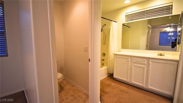 full bath with toilet, baseboards, shower / bath combination with curtain, and vanity