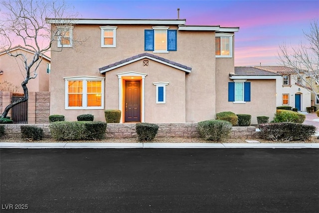 view of front of home with stucco siding