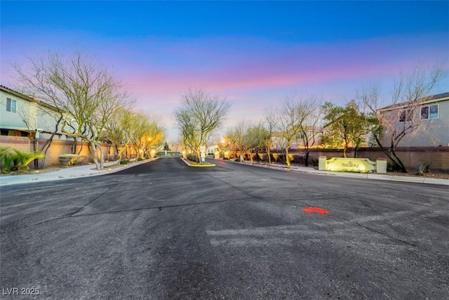 view of street featuring curbs and sidewalks