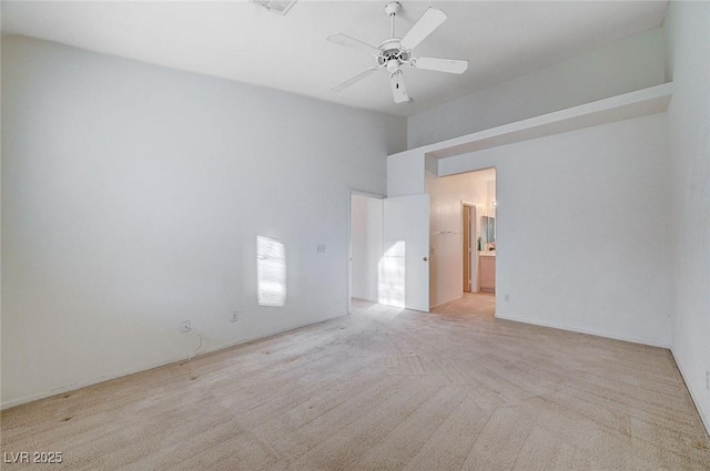 empty room with carpet and ceiling fan