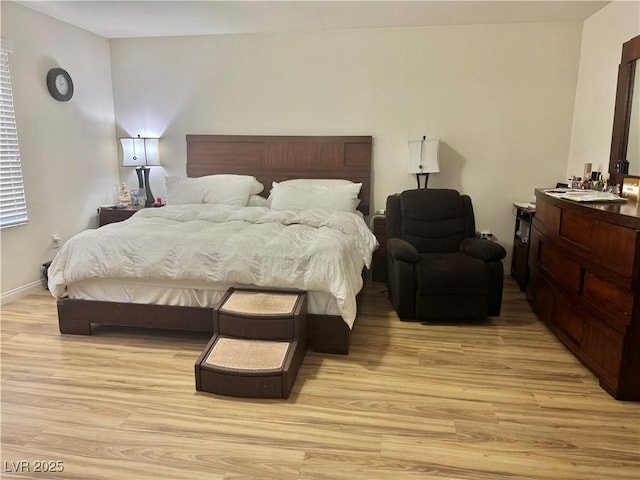 5320 Tartan Hill Ave, Las Vegas, NV 89141 - bedroom featuring light wood finished floors and baseboards