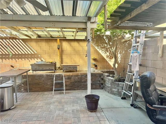 5320 Tartan Hill Ave, Las Vegas, NV 89141 - view of patio with exterior kitchen, a fenced backyard, and a grill