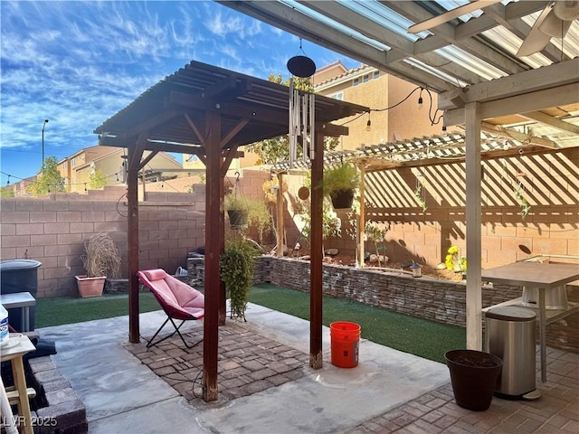 5320 Tartan Hill Ave, Las Vegas, NV 89141 - view of patio / terrace featuring a fenced backyard and a pergola