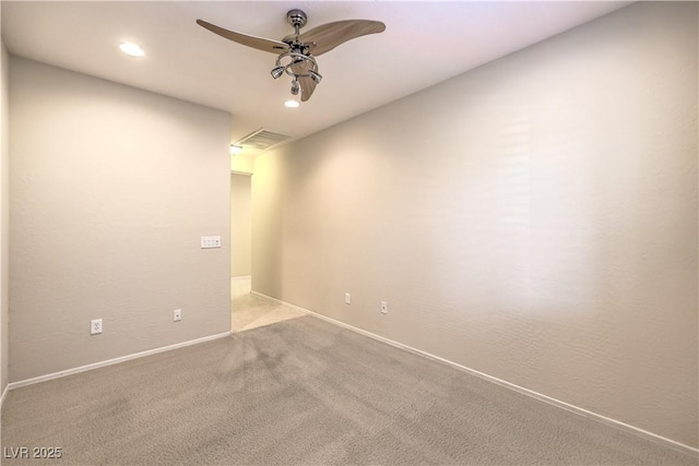 unfurnished room featuring baseboards, visible vents, a ceiling fan, light colored carpet, and recessed lighting