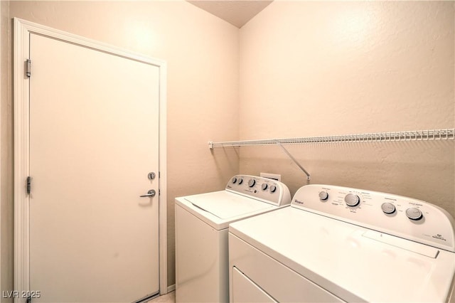 laundry room featuring laundry area and separate washer and dryer