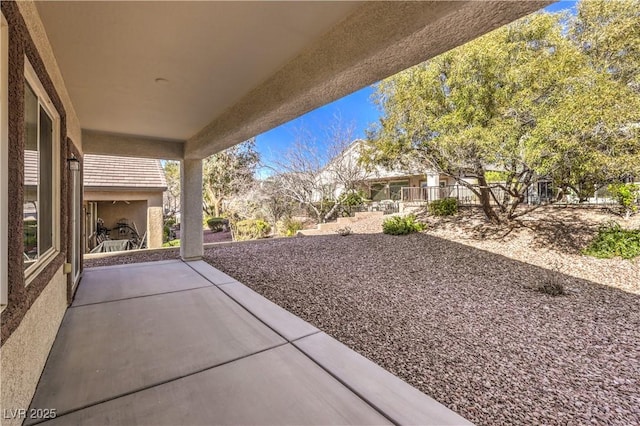 view of patio / terrace with fence