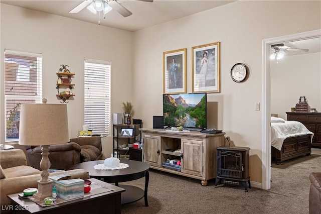 living room featuring a ceiling fan and light colored carpet