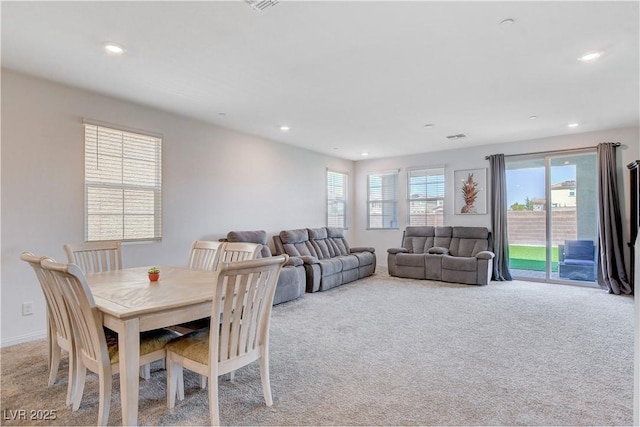 dining area featuring recessed lighting, light carpet, visible vents, and baseboards