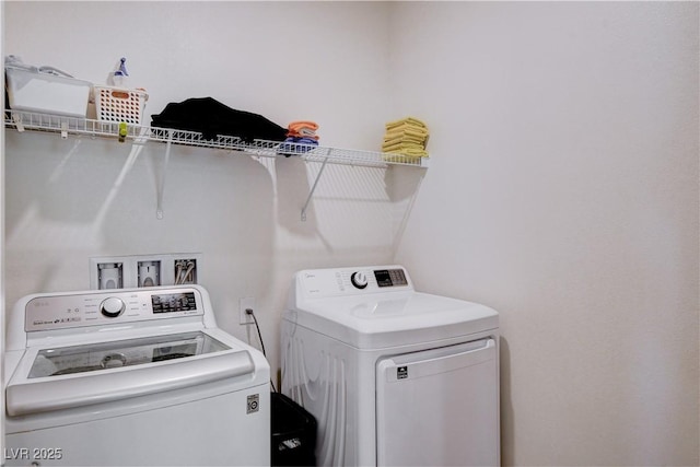 laundry area with laundry area and washing machine and dryer