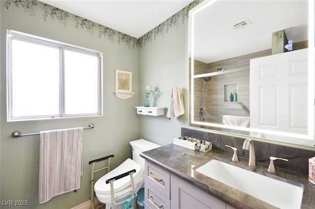 full bathroom with radiator, visible vents, toilet, vanity, and tiled shower