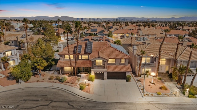 exterior space featuring a mountain view and a residential view