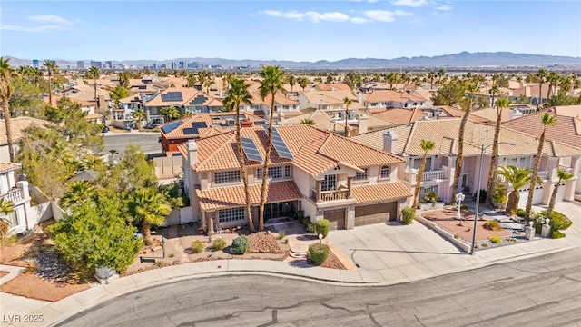 birds eye view of property featuring a residential view and a mountain view