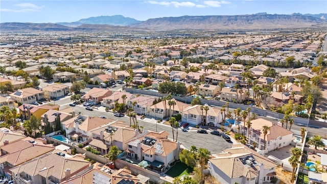 drone / aerial view featuring a residential view and a mountain view