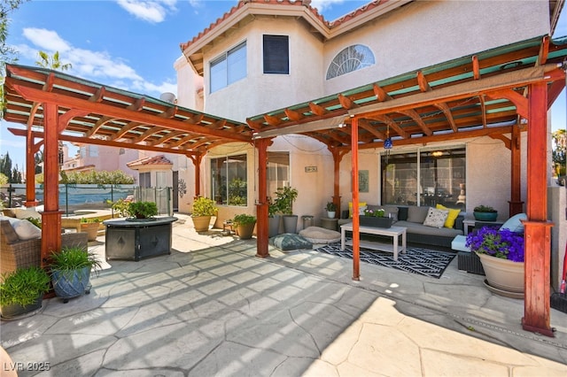 view of patio / terrace featuring an outdoor hangout area and a pergola