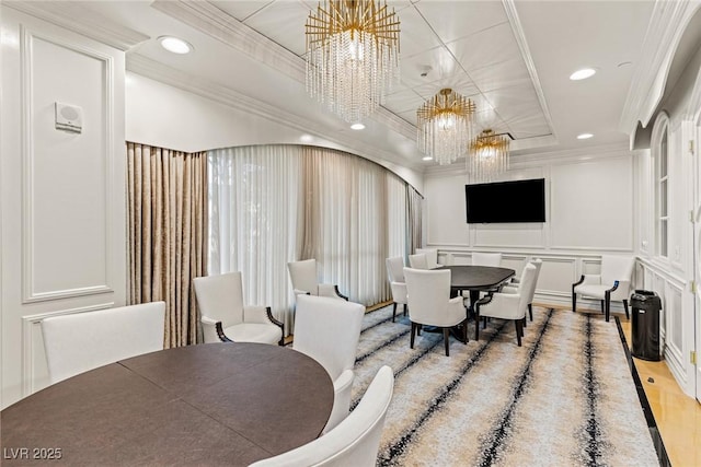 9101 Alta Dr Unit 1206, Las Vegas, NV 89145 - dining room with a chandelier, a decorative wall, recessed lighting, crown molding, and wood finished floors