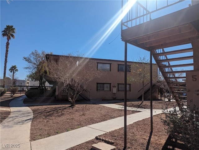 exterior space featuring stucco siding