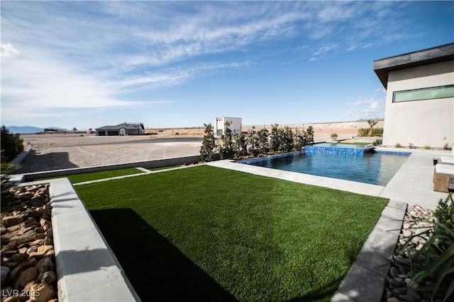 view of yard featuring an infinity pool