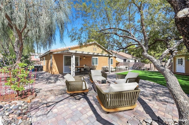 view of patio / terrace featuring outdoor dining space, an outdoor hangout area, ceiling fan, and fence