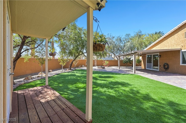 view of yard featuring a patio and a fenced backyard