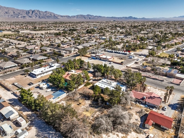 bird's eye view featuring a residential view and a mountain view