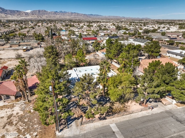 drone / aerial view with a residential view and a mountain view