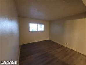 interior space featuring dark wood-style floors