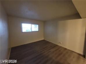 interior space featuring dark wood-style flooring