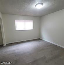 interior space featuring baseboards