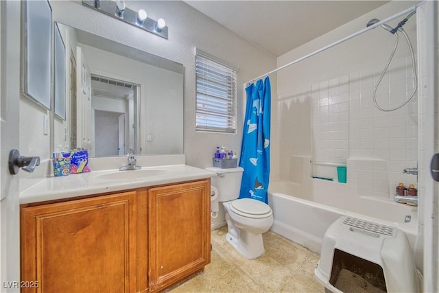 full bathroom featuring vanity, toilet, and shower / bath combo