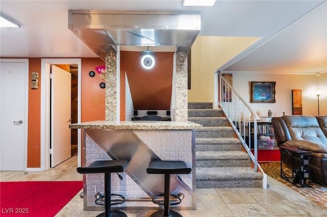 interior space featuring a breakfast bar