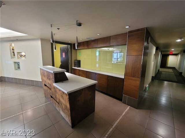 bar with light tile patterned floors, recessed lighting, and pendant lighting