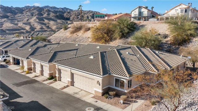 bird's eye view with a residential view and a mountain view