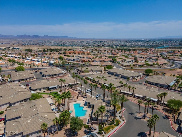 drone / aerial view featuring a mountain view and a residential view