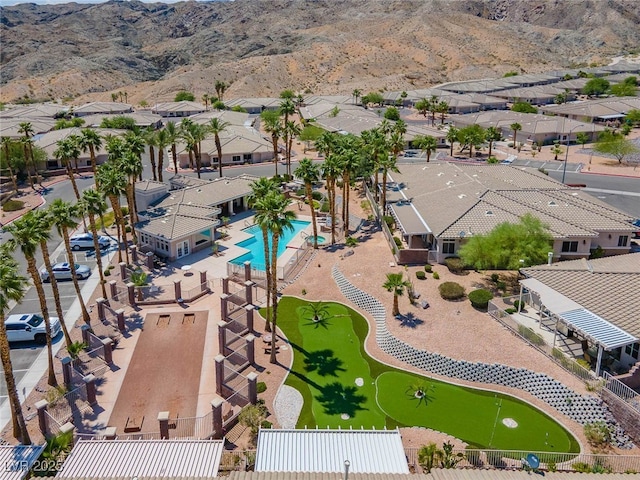 birds eye view of property with a residential view and a mountain view