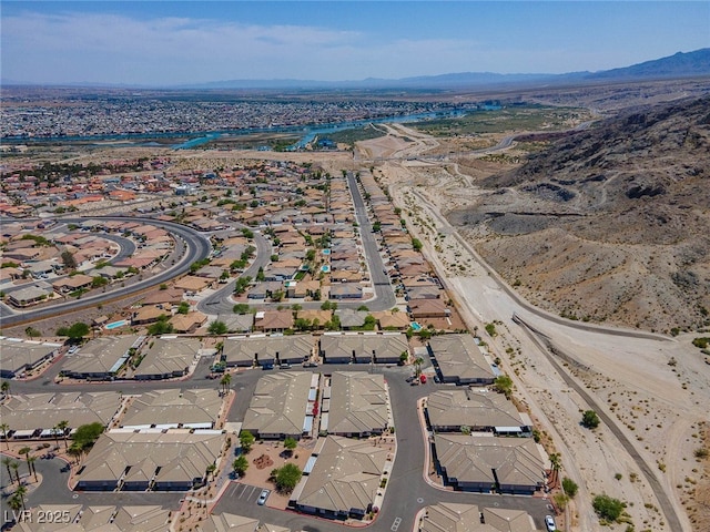 bird's eye view with a residential view and a mountain view