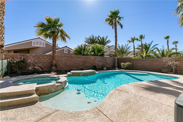 view of swimming pool featuring a fenced backyard and a pool with connected hot tub