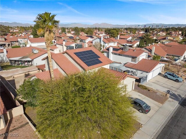 birds eye view of property featuring a residential view and a mountain view