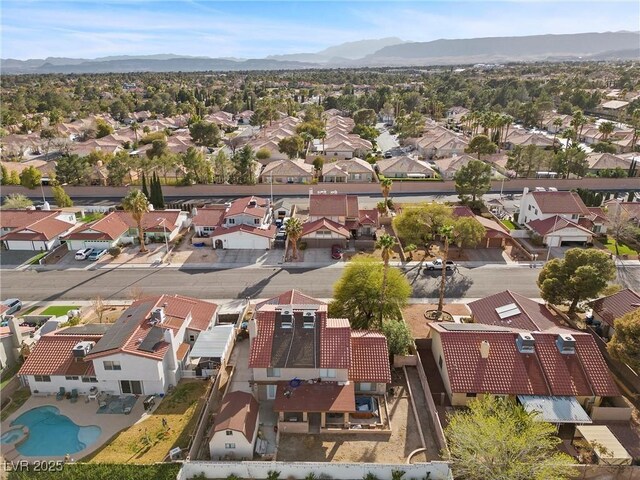 bird's eye view with a residential view and a mountain view