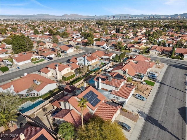 birds eye view of property featuring a residential view and a mountain view