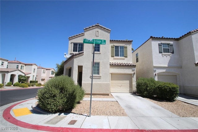 mediterranean / spanish home featuring concrete driveway, an attached garage, a residential view, and stucco siding