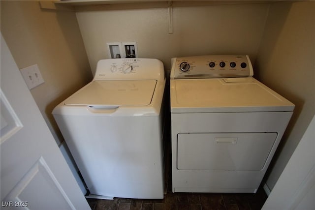 laundry area with washing machine and dryer