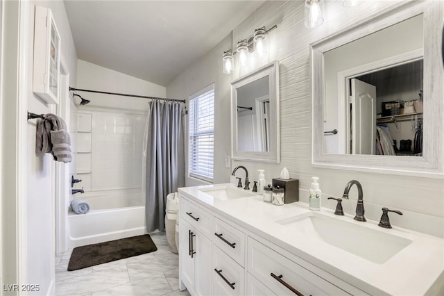 bathroom featuring lofted ceiling, double vanity, a sink, and shower / tub combo with curtain