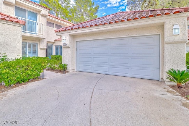 garage featuring driveway