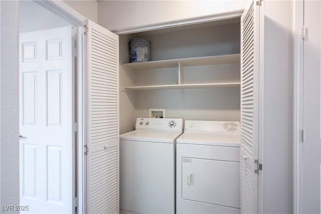 laundry area with laundry area and independent washer and dryer