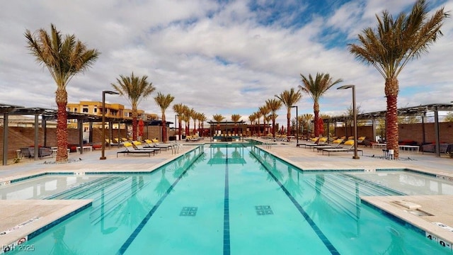 community pool with a patio