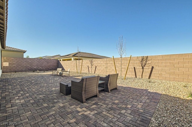 view of patio featuring a fenced backyard