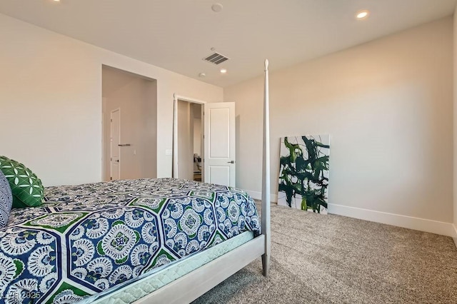 carpeted bedroom with recessed lighting, visible vents, and baseboards