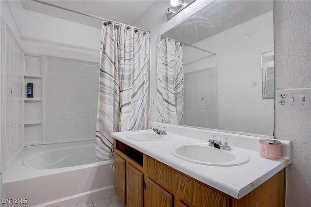 full bath with shower / bath combination with curtain, a sink, and double vanity